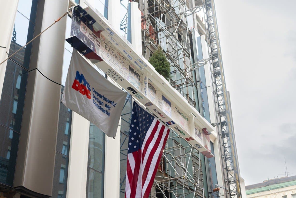 Topping-out of the Brooklyn facility with the final steel beam in place, 2026