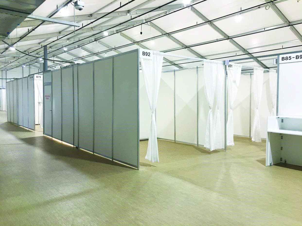 Patient bays inside a treatment tent